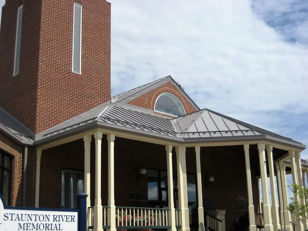 Skilled roofing craftsmen working on a residential roof in Bakers Summit